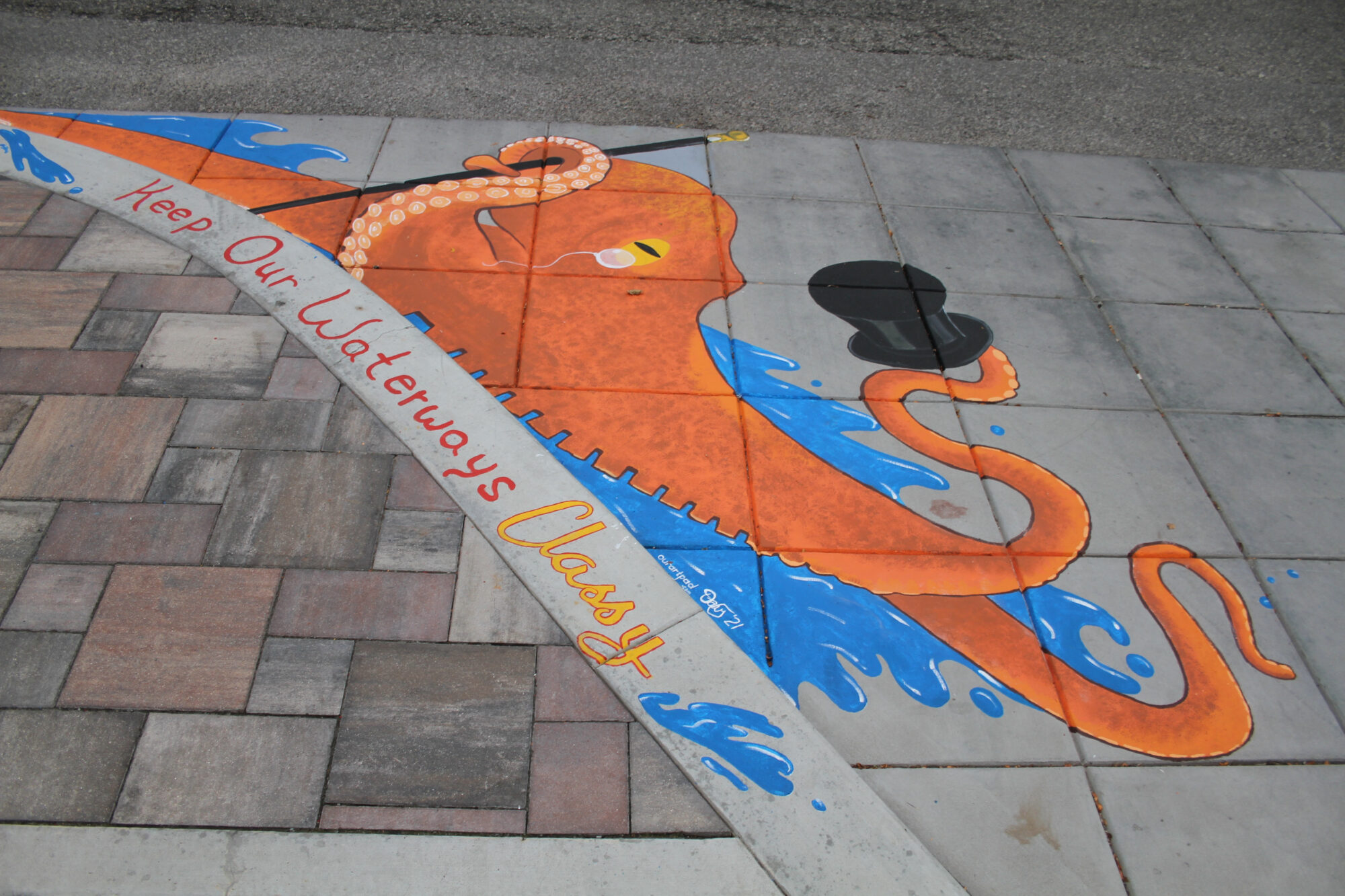 Clean Drains mural depicting an octopus with a top hat.