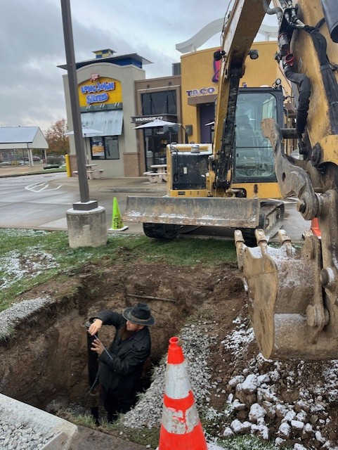 Photo of a curb box being installed along Bluffton Rd.