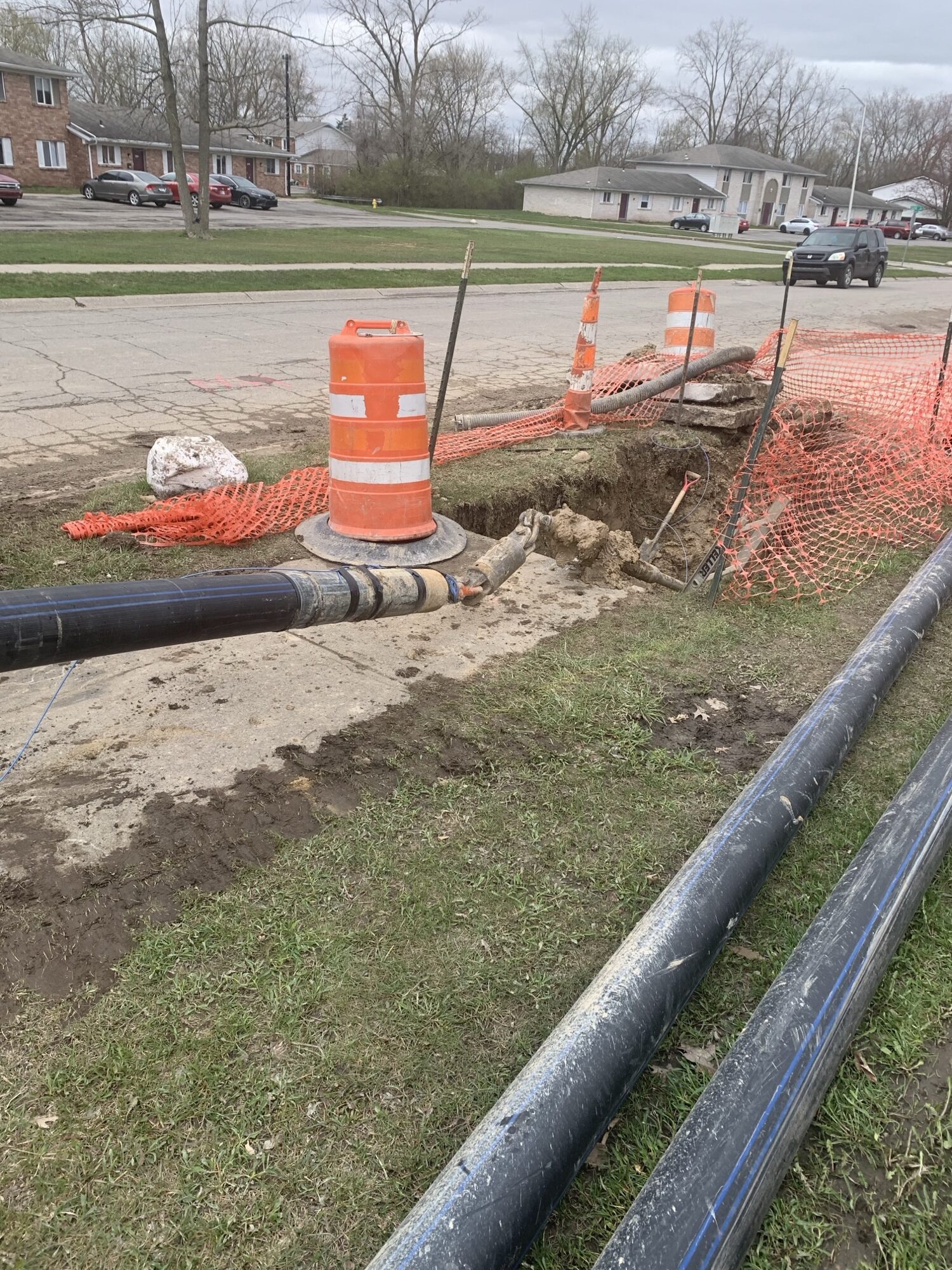 Images of the pipes being inserted into the ground.