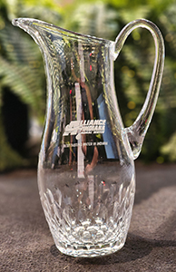 A picture of the 2024 Best Tasting Water Award which is a glass water pitcher.