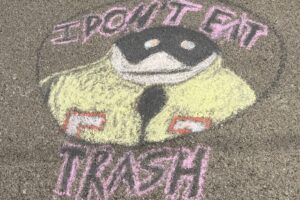 IMG_1121 Chalk drawing of a whale with the text "I don't eat trash" around the animal.