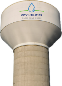 Water tower with City Utilities logo on the tank.