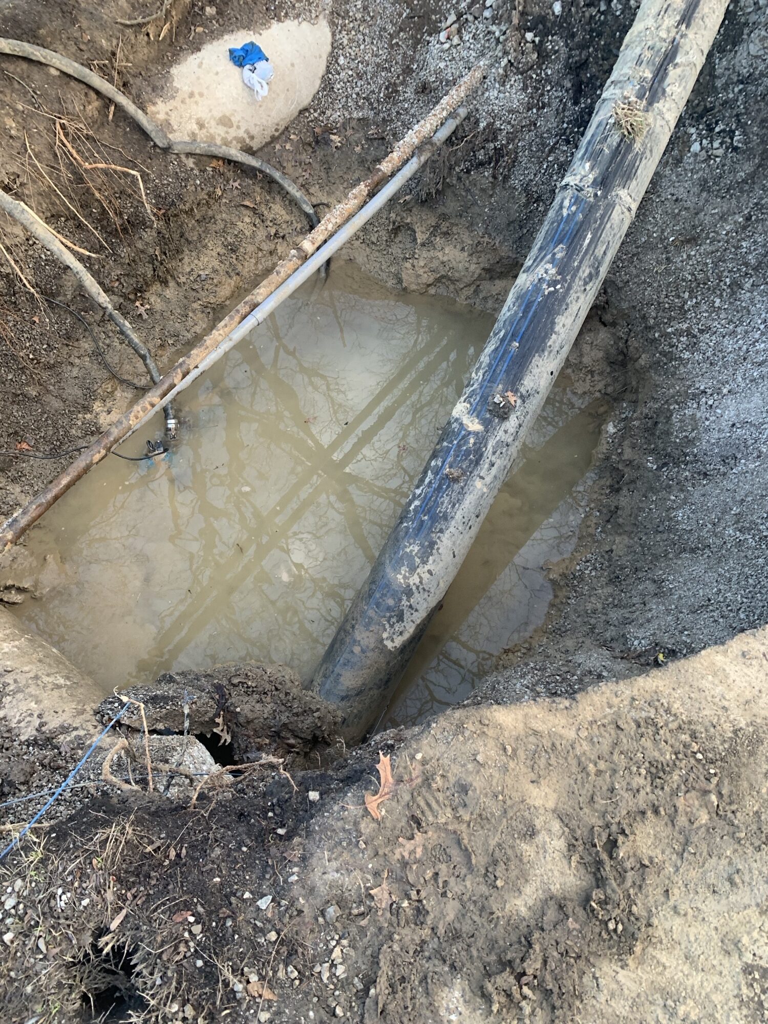 Close-up of stillwater in construction site with muddy water.